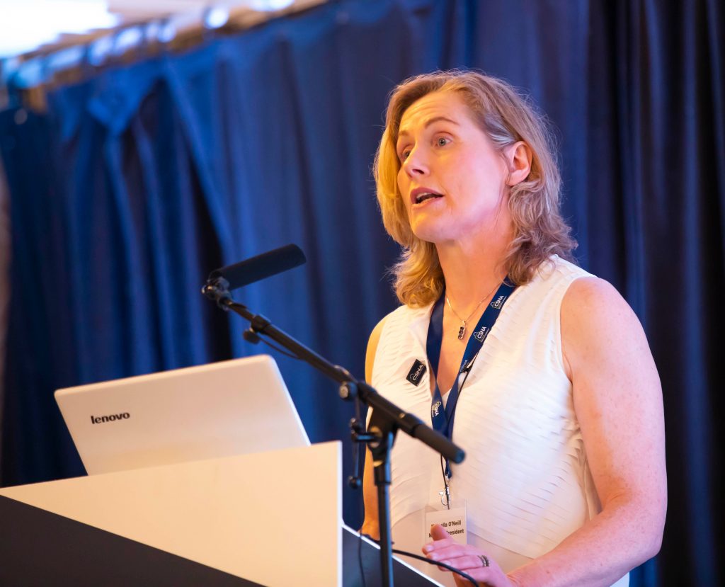 Marcella O'Neill presenting the CSNA 2019 Security Report at the CSNA National Conference in May 2019